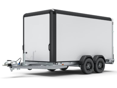 Veetrailer met dubbele as en witte zijpanelen voor transport en opslag.